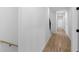 Bright hallway featuring hardwood floors and staircase at 90 Cleveland Se St # B, Atlanta, GA 30316