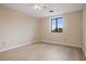 Simple bedroom with large window and ceiling fan at 300 Johnson Ferry Ne Rd # B413, Atlanta, GA 30328