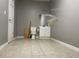 Simple basement bathroom with toilet, sink, and vanity at 690 Maggie Mae Ln, Lawrenceville, GA 30045