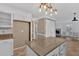 Kitchen island with granite countertop, open to Gathering room at 17 Wexford Nw Cir, Cartersville, GA 30121