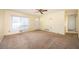 Living room with carpeted floors and view to kitchen at 2049 Nancy Se Cir, Smyrna, GA 30080