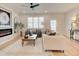 Living room with fireplace, large windows and light flooring at 4814 Floydwood Ln, Mableton, GA 30126