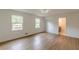 Bright bedroom with hardwood floors, access to bathroom and closet at 3607 Paddock Dr, Decatur, GA 30034