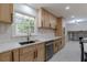 Updated kitchen with stainless steel appliances and white cabinets at 3607 Paddock Dr, Decatur, GA 30034