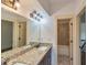 Bathroom with granite countertops, double vanity, and tiled shower/tub at 45 Knight Ln, Mcdonough, GA 30252