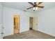 Bedroom with ceiling fan and access to two bathrooms at 45 Knight Ln, Mcdonough, GA 30252