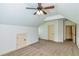 Spacious bonus room with carpet, ceiling fan, and ample closet space at 45 Knight Ln, Mcdonough, GA 30252