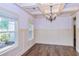 Formal dining room with hardwood floors and coffered ceiling at 45 Knight Ln, Mcdonough, GA 30252