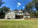 Two-story house with stone accents and landscaping at 45 Knight Ln, Mcdonough, GA 30252