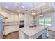 Kitchen features granite countertops, custom cabinetry, and hardwood floors at 45 Knight Ln, Mcdonough, GA 30252