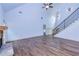 Living room featuring hardwood floors and a staircase at 45 Knight Ln, Mcdonough, GA 30252