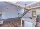 Open living room with hardwood floors and a fireplace at 45 Knight Ln, Mcdonough, GA 30252