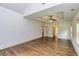 Bright main bedroom featuring hardwood floors and high ceilings at 45 Knight Ln, Mcdonough, GA 30252