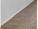 Close-up view of carpeted floor and baseboard at 623 Gabby Sw Pt, Mableton, GA 30126