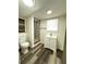 Basement bathroom with shower, toilet, and vanity at 3571 Quail Hollow Trl, Snellville, GA 30039