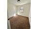 Bright bedroom with neutral-toned carpet at 3571 Quail Hollow Trl, Snellville, GA 30039