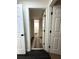 Clean hallway with doors leading to other rooms at 3571 Quail Hollow Trl, Snellville, GA 30039