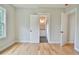 Bedroom with hardwood floors and en-suite bathroom at 2201 E Maddox Rd, Buford, GA 30519