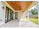 Covered patio with brick flooring and ceiling fan at 2201 E Maddox Rd, Buford, GA 30519