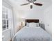 Bedroom featuring hardwood floors and a ceiling fan at 450 Shadowlawn Se Rd, Marietta, GA 30067