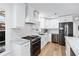 Modern kitchen featuring stainless steel appliances and white cabinetry at 450 Shadowlawn Se Rd, Marietta, GA 30067