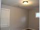 Simple bedroom with gray walls and window blinds at 1026 Valley View Rd, Atlanta, GA 30315