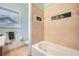 Bathroom boasts a large bathtub and artistic tilework at 1379 Christmas Ne Ln, Atlanta, GA 30329