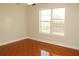 Bedroom with ceiling fan and wood-look tile floors at 321 Whitney Ln, Mcdonough, GA 30253