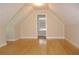 Bonus room with bamboo floors and sloped ceilings at 321 Whitney Ln, Mcdonough, GA 30253