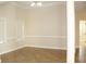 Bright dining room with tile floors and neutral walls at 321 Whitney Ln, Mcdonough, GA 30253