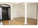 Hardwood and tile entryway floors, featuring an arched door at 321 Whitney Ln, Mcdonough, GA 30253