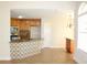 Kitchen with wood cabinets, granite counters, and island at 321 Whitney Ln, Mcdonough, GA 30253