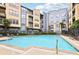 Community pool with plenty of lounge chairs for relaxation at 400 17Th Nw St # 2427, Atlanta, GA 30363