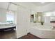 Bathroom with a large garden tub and city views at 3820 Roswell Ne Rd # 510, Atlanta, GA 30342