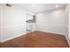 Simple dining area with hardwood floors and access to kitchen at 18 Ivy Ne Rdg, Atlanta, GA 30342