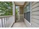 Private balcony with white railing and view of trees at 2700 Pine Tree Ne Rd # 2215, Atlanta, GA 30324