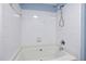 Bathroom with white tiled tub and shower at 2700 Pine Tree Ne Rd # 2215, Atlanta, GA 30324