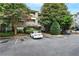 Building exterior with parking and landscaping at 2700 Pine Tree Ne Rd # 2215, Atlanta, GA 30324