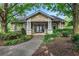 Community clubhouse with inviting front entrance and landscaping at 2700 Pine Tree Ne Rd # 2215, Atlanta, GA 30324