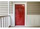 Red front door entrance to condo unit at 2700 Pine Tree Ne Rd # 2215, Atlanta, GA 30324