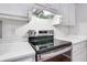 Stainless steel stove and range in this modern kitchen at 2700 Pine Tree Ne Rd # 2215, Atlanta, GA 30324