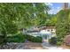 Relaxing community pool with surrounding landscaping at 2425 Wayward Run, Cumming, GA 30041