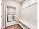 Laundry room with washer, dryer and bench at 2678 Songbird Ln, Grayson, GA 30017