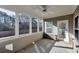 Bright screened porch with view of backyard at 2678 Songbird Ln, Grayson, GA 30017