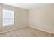 Spacious bedroom with large window and carpet at 2070 Bonny Glen Cir, Austell, GA 30106