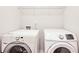 Bright laundry room, featuring a washer and dryer at 2070 Bonny Glen Cir, Austell, GA 30106