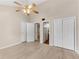 Spacious bedroom with ceiling fan, ample closet space, and hardwood floors at 4234 Stillwater Dr, Duluth, GA 30096