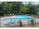 Community swimming pool with lounge chairs at 4234 Stillwater Dr, Duluth, GA 30096