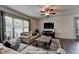 Spacious living room with hardwood floors and large windows at 1527 Landmark Ln, Cumming, GA 30040