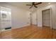 Spacious bedroom with hardwood floors, ceiling fan, and en-suite bathroom at 2173 Cloverdale Se Dr, Atlanta, GA 30316